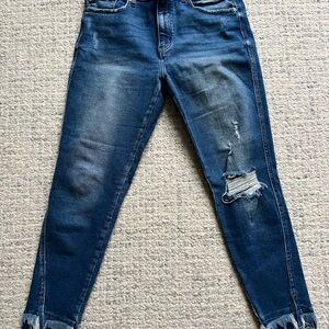 Distressed Blue Jeans